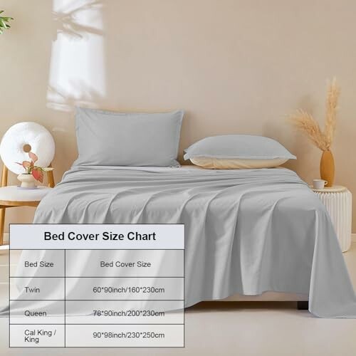 Bed with gray cover and size chart on display